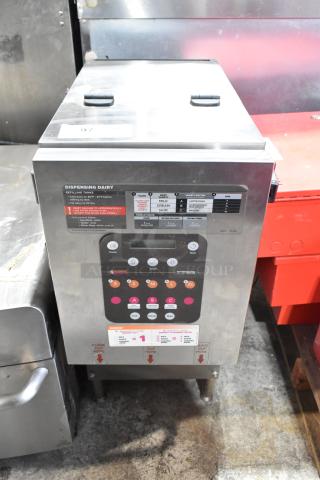 Silver King stainless steel commercial dairy dispenser, 115 volts, 1 phase, with control panel and cup placement markings.
