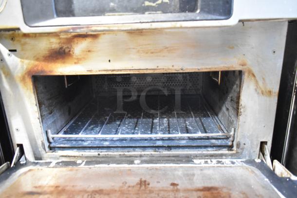 Turbochef Encore 2 stainless steel rapid cook oven, showing interior. Used condition with visible signs of wear. 208/240V, 1 Phase.