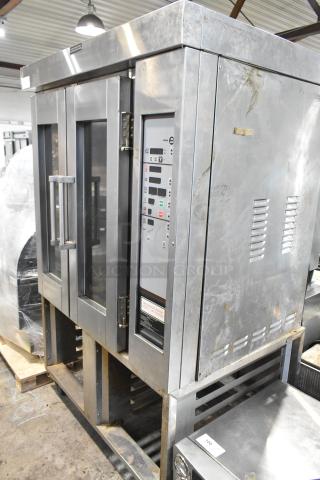 Baxter Stainless Steel Commercial Natural Gas Powered Mini Rotating Rack Oven on Double Pan Rack w/ Commercial Casters. 95,000 BTU. - Item #1227596