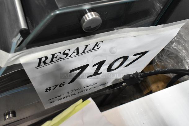 Brand new Avantco OAM2A 26" black countertop merchandiser, LED lighting, two shelves, 120V, scratch and dent.