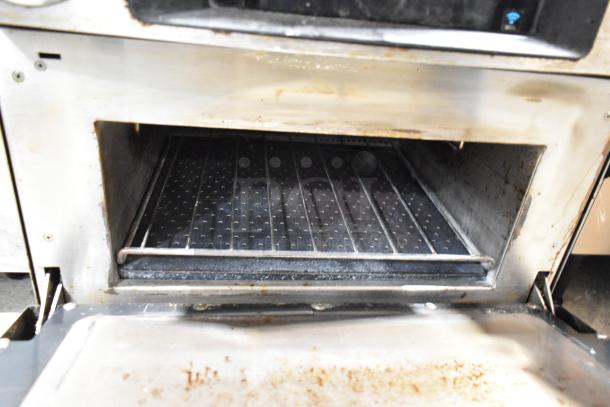 2016 Turbochef Encore 2 stainless steel rapid cook oven, electric-powered, countertop model. Interior shows signs of use.