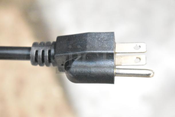 Close-up of a power plug for the Avantco 193BC60HCB refrigerated bakery display case, 110-120 volts, 1 phase.