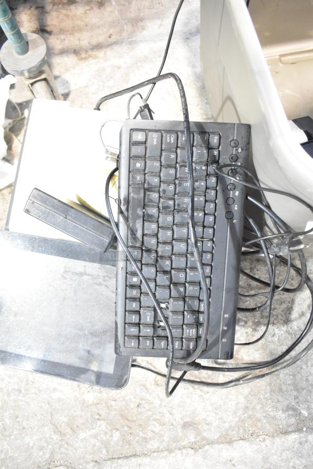 Lot of items including Benseron POS monitor, black keyboard, cables, and metal cash drawer in gray bin; used condition.