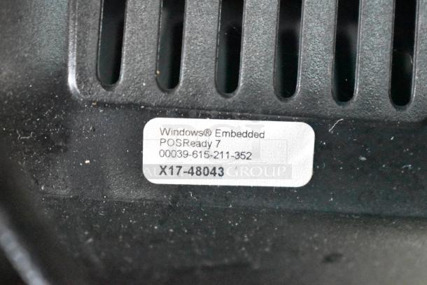 Label on Benseron POS monitor showing "Windows Embedded POSReady 7" with serial number X17-48043.