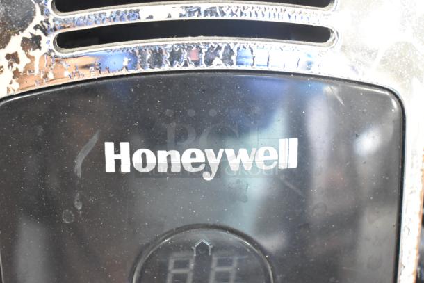 Honeywell KAZ HZ-709-WMT air heater, featuring 120 volts, 1 phase, with visible wear on surface.