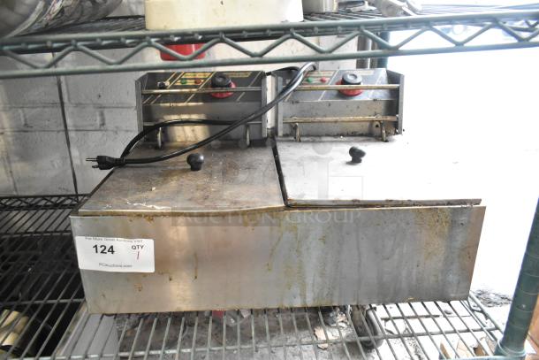 ET-ZL2 stainless steel 2-bay electric fryer with metal lids, 110 volts, 1 phase, showing signs of use, model ET-ZL2.