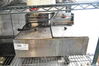 ET-ZL2 stainless steel 2-bay electric fryer with metal lids, 110 volts, 1 phase, showing signs of use, model ET-ZL2.