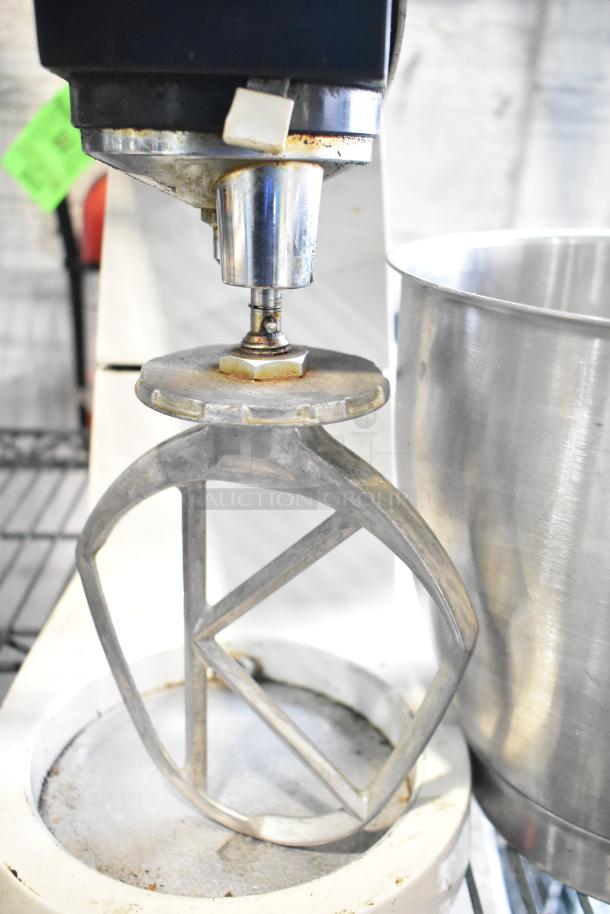 Blakeslee K7 metal countertop dough mixer with mixing bowl and pastry paddle. 120V, 1 phase. Features visible wear.