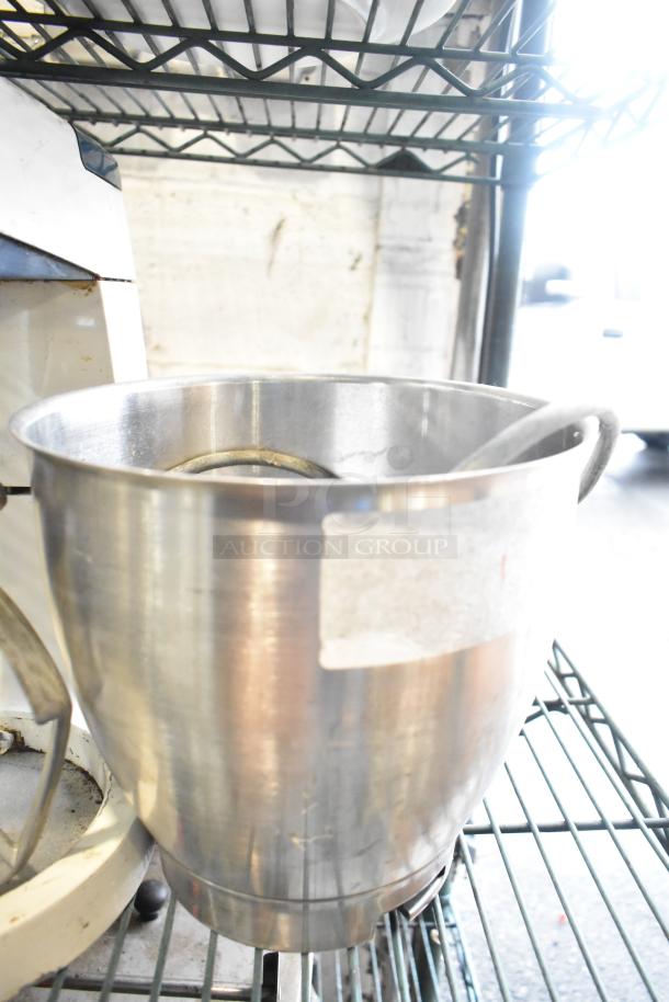 Blakeslee K7 metal dough mixer with mixing bowl and pastry paddle attachment, 120 volts, 1 phase, used condition.