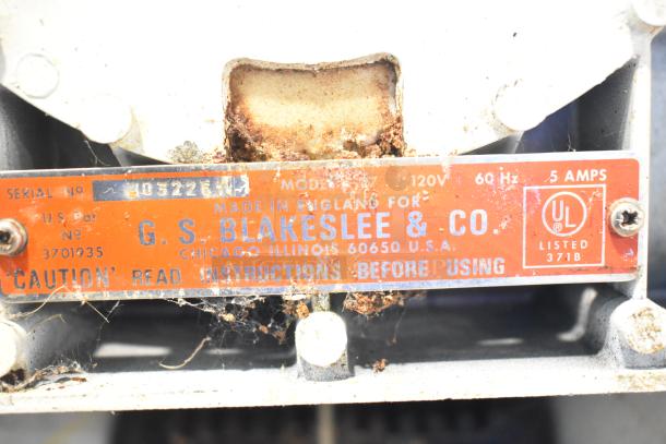 Blakeslee K7 mixer nameplate. Details: 120V, 60Hz, 5A. Made in England for G.S. Blakeslee & Co., Chicago. Read instructions before use.