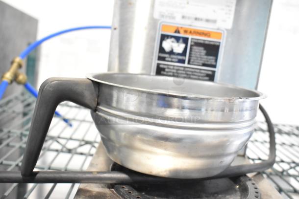 Bunn CDBCFP20 stainless steel coffee machine with metal brew basket, features hot water dispenser. 120V, 1 Phase.