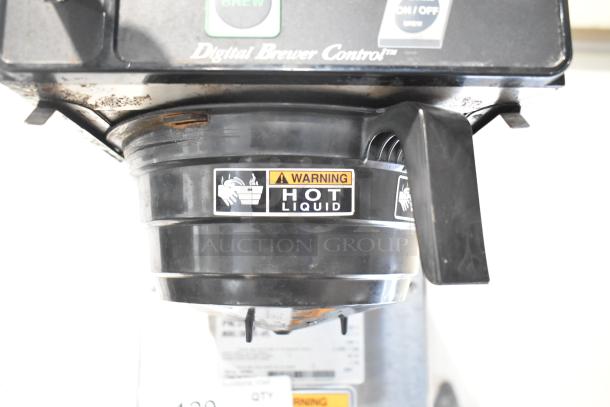 Bunn CDBCF15-APS stainless steel commercial coffee machine with hot water dispenser, features poly and metal brew baskets, 120V.