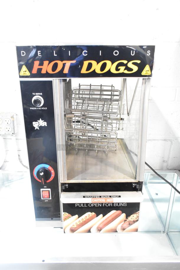 Star 174CBA stainless steel hot dog broiler with bun warmer, 120V, excellent condition, branded controls, and warning labels.