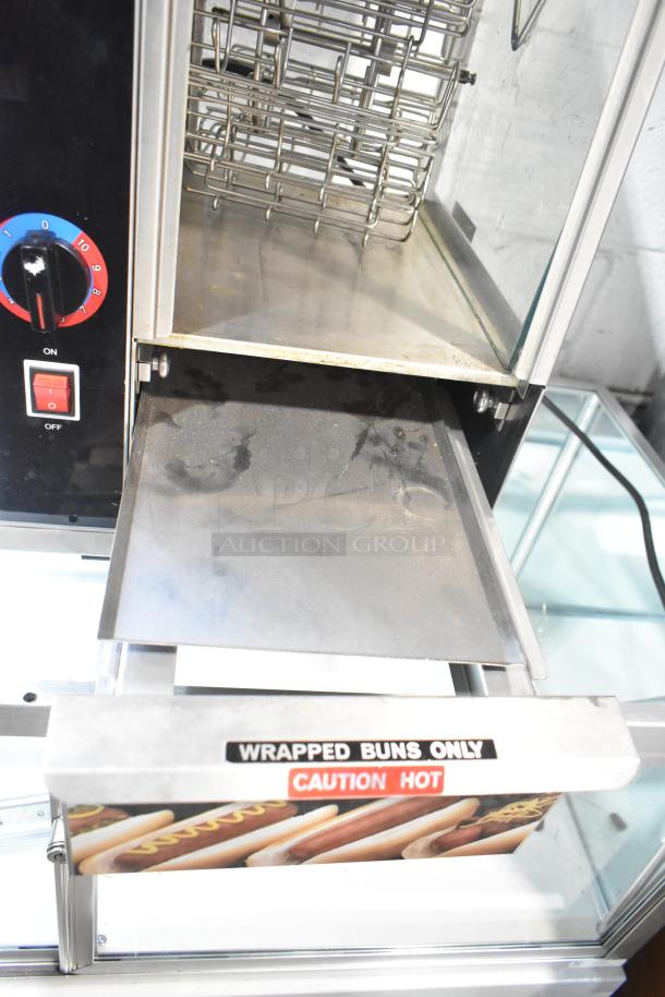 Star 174CBA Stainless Steel Hot Dog Broiler with Bun Warmer. Features on/off switch, bun tray, "Caution Hot" labeling. 120V.