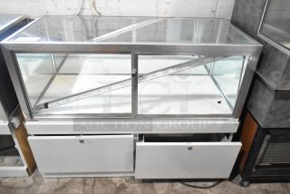 Jahabow metal commercial dry merchandise display case with glass panels, lockable drawers, and LED light strip.
