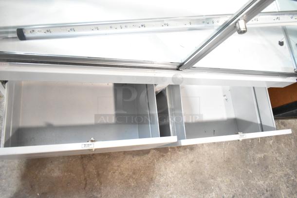 Jahabow Metal Commercial Display Case with glass front, LED lighting, and two sliding drawers. Excellent condition.