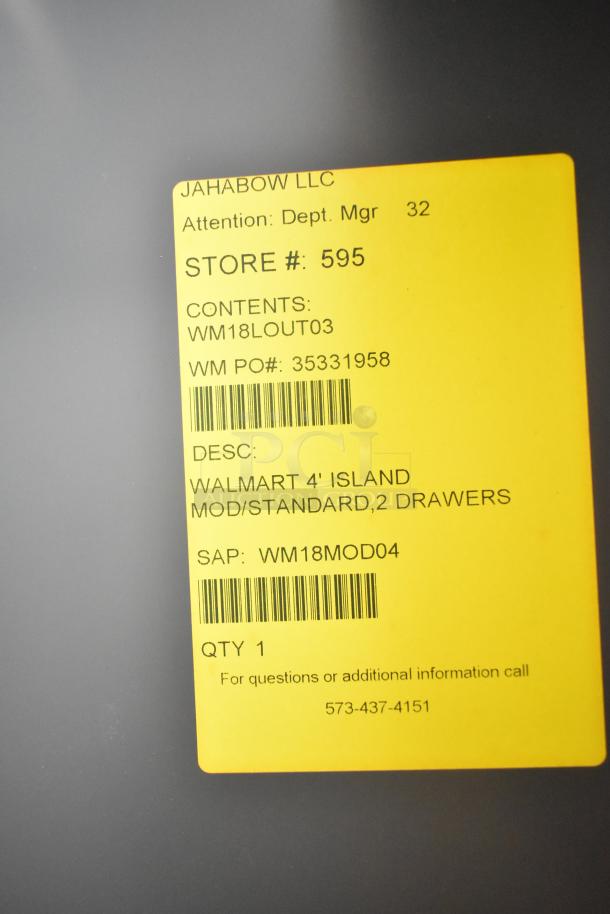 Jahabow Metal Display Case with tag showing store number 595, product codes, and contact information.