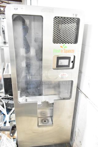 LATE MODEL JBT 2ND-GEN-MFJ-HE stainless steel citrus juicer, commercial floor style, on casters, 120V, 1 phase.