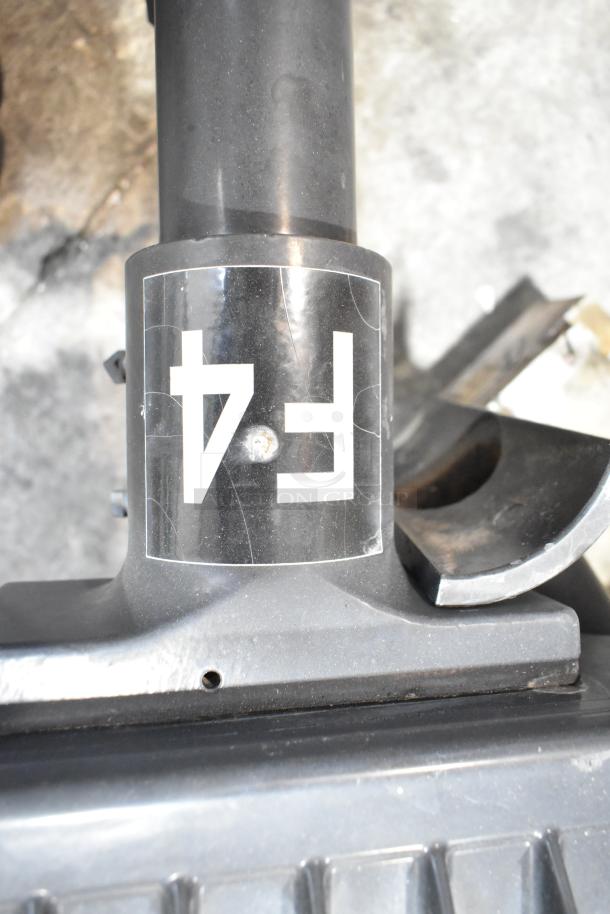 11 metal outdoor light fixtures, includes GE. Features sturdy construction, slight wear, marked "F4" for identification.