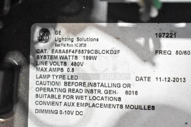 GE lighting solutions tag with model CAT_EASA6F4F5579CBLCKD2F, 199W, 480V, max 0.6A, LED type, dated 11-12-2013. Suitable for wet locations.