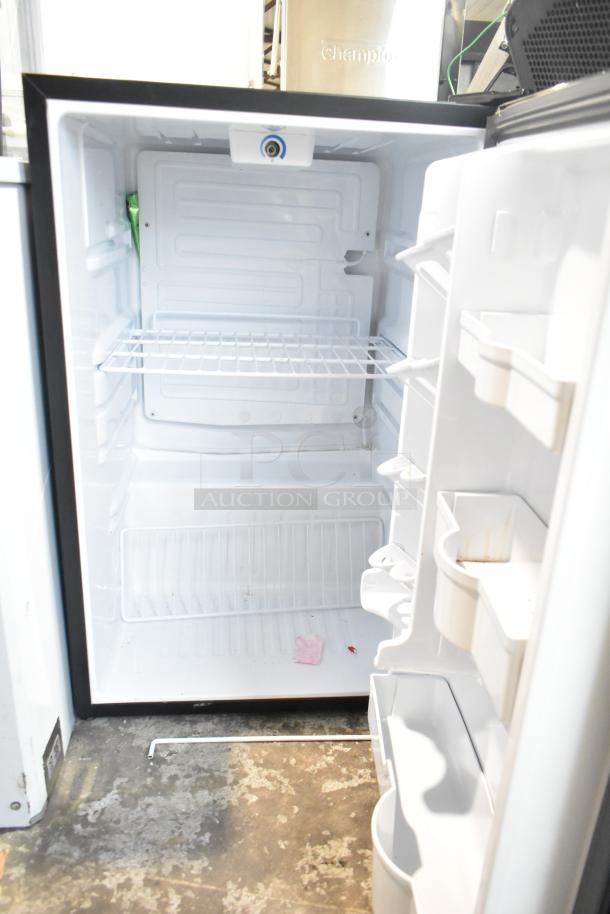 Danby DAR044A4BDD Mini Cooler, 115 Volts, 1 Phase. Features adjustable shelving, interior light, and compact design.