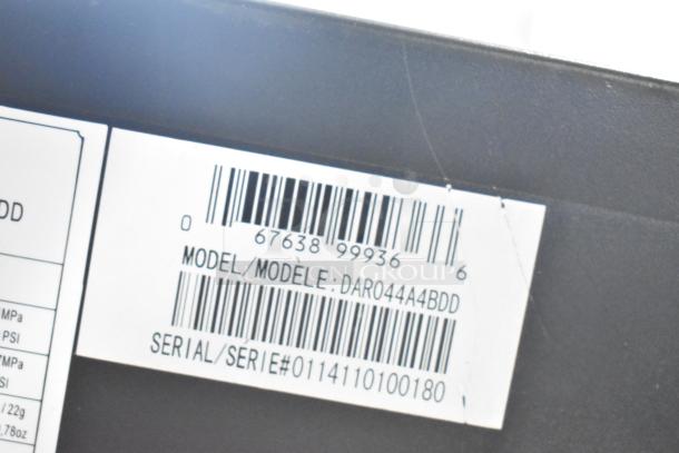 Danby mini cooler model DAR044A4BDD with a visible label showing the serial number and barcode.