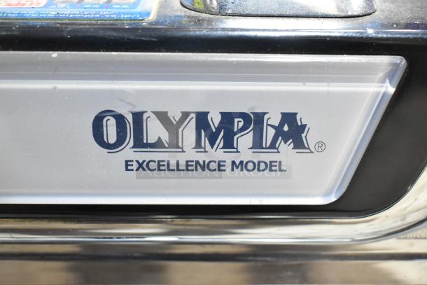 Olympia Excellence Metal Ice Story Slot Machine with model branding visible.