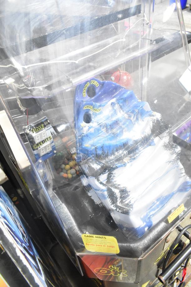 Gravity Hill Metal Floor Style Arcade Game, vibrant mountain design, visible time and credits display, game hints label.