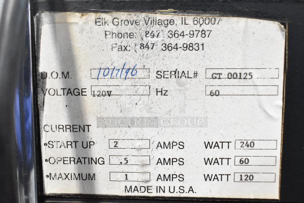 Metal floor style slot machine label showing 120V, 1 phase, serial GT 00125, dated 10/17/96, made in USA.