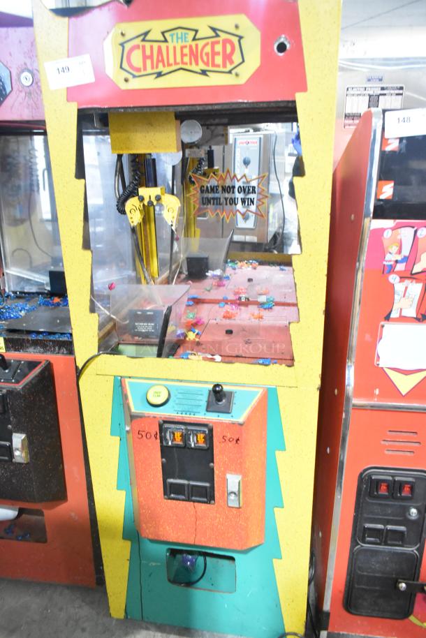 The Challenger metal floor-style claw machine, 120 volts, 1 phase, features colorful design and gameplay message.