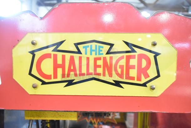 The Challenger metal floor-style claw machine, 120 volts, 1 phase, featuring bold red and yellow design.