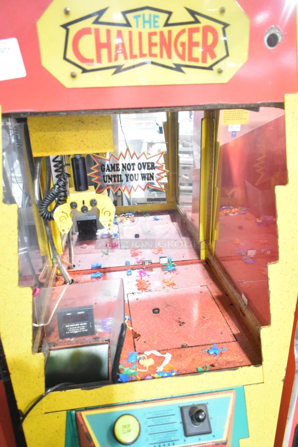 The Challenger metal claw machine, floor style, 120 volts, 1 phase, fair condition, visible maintenance needed.
