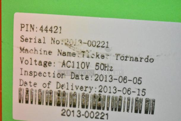 Alt text: Label of Ticket Tornado arcade machine showing PIN 44421, Serial No: 2013-00221, AC110V 50Hz, inspected and delivered in 2013.
