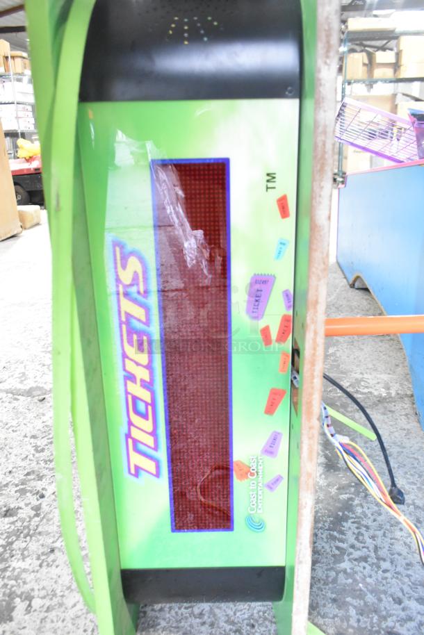 Green electronic tickets sign, "Tickets" text, Coast to Coast Entertainment logo. Operational condition, visible wiring.