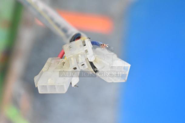 Frayed electrical wires with white connectors, showing exposed copper. Condition: worn with visible damage.