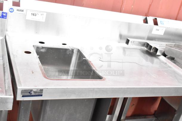 Stainless steel commercial single bay sink with backsplash and under shelf. Features NSF certification, item no. 163.