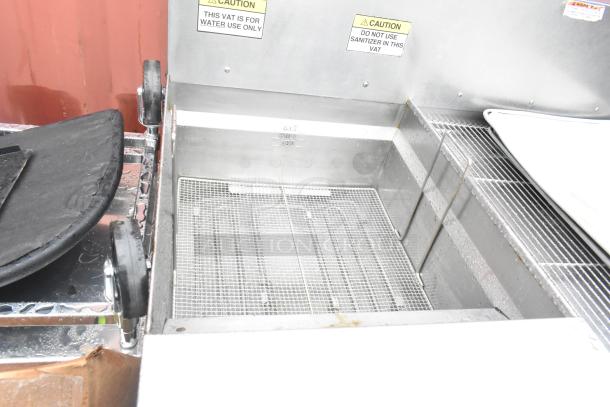 Giles EOF-24 stainless steel 3 bay fryer with EOF-BIB dumping station, 480V, 3 phase. Includes caution labels.