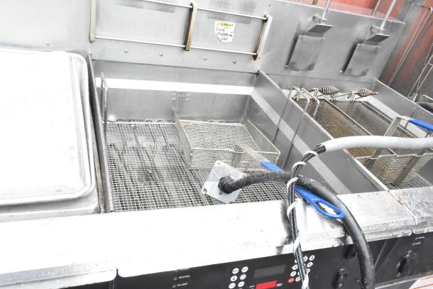 Giles EOF-24 stainless steel 3 bay fryer with EOF-BIB dumping station. Features include control panel, baskets, and labeling.