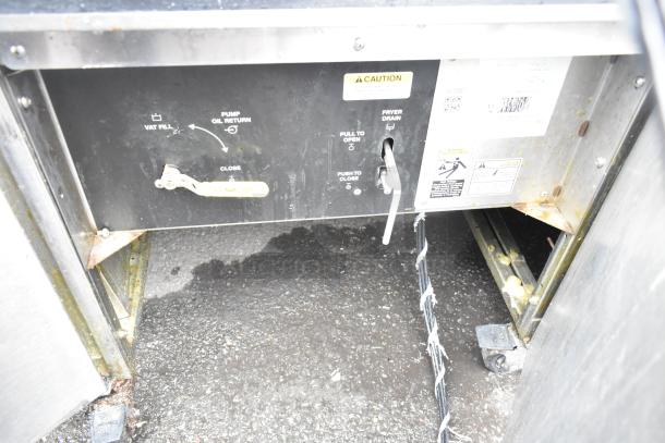 Giles EOF-24 stainless steel commercial fryer base, showing oil control panel and electrical connections. Model EOF-BIB.