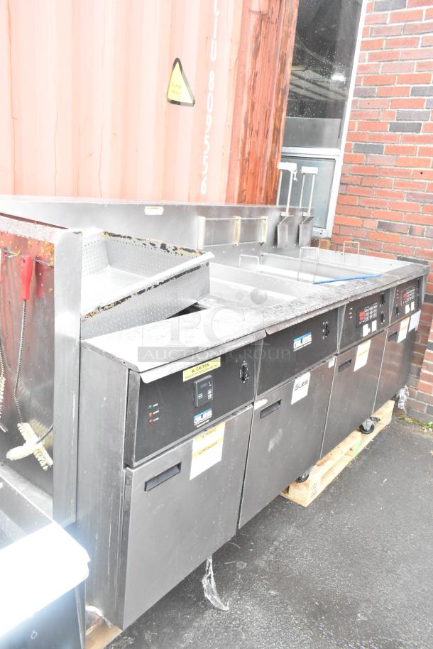 Giles EOF-24 Stainless Steel 3 Bay Electric Fryer with EOF-BIB Dumping Station, 480V, 3 Phase, good condition.