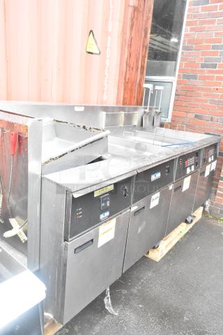 Giles EOF-24 Stainless Steel 3 Bay Electric Fryer with EOF-BIB Dumping Station, 480V, 3 Phase, good condition.