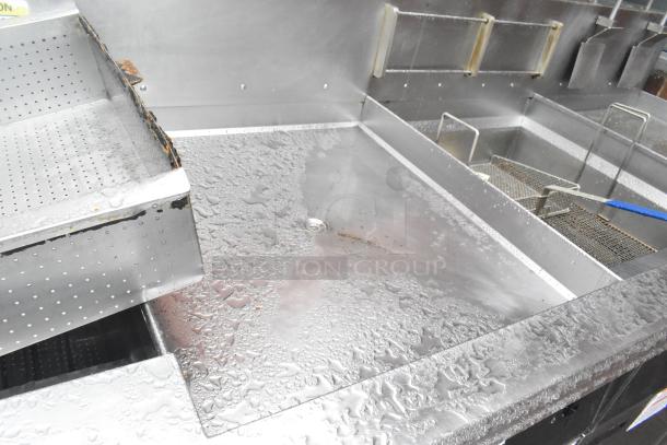 Giles EOF-24 stainless steel 3 bay fryer with EOF-BIB dumping station, visible wear, 480V, 3 phase, commercial use.