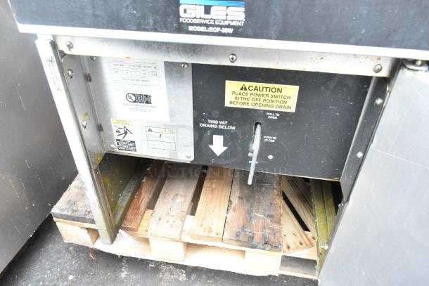 Giles EOF-24 stainless steel commercial 3 bay fryer with EOF-BIB dumping station, 480V, 3-phase, visible caution labels.