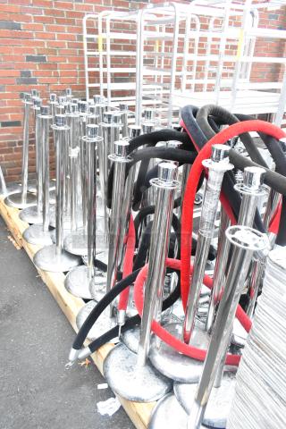 44 chrome finish metal stanchions with black and red ropes, new condition. Ideal for crowd control and events.