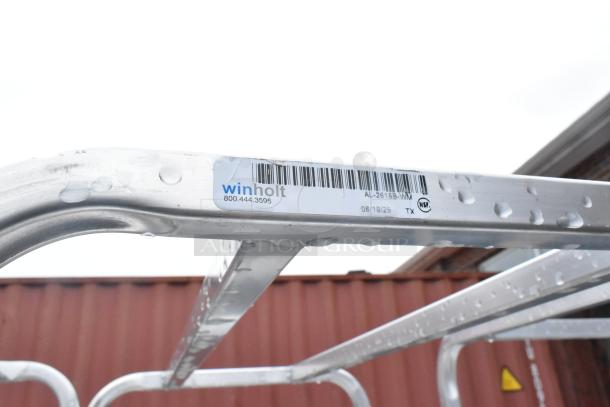 Winholt metal commercial pan transport rack with casters, features barcode label, model AL-2615B-WM, NSF certified.
