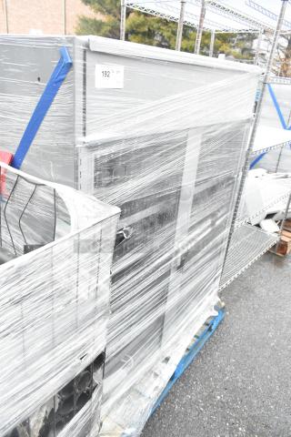 Gray 2-door merchandising cabinets, wrapped, auction lot 192, excellent condition. Double your bid offer available.