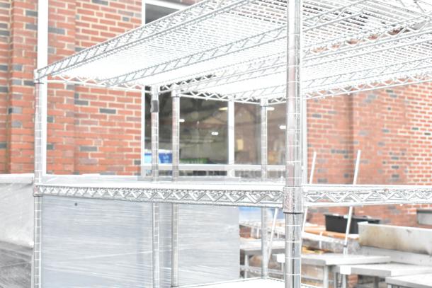 5-tier chrome wire shelving unit, durable construction, pristine condition, dismantling required, consider freight.