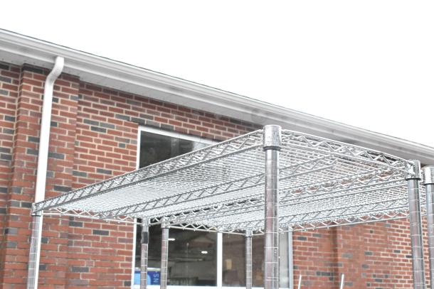 Chrome finish 5-tier wire shelving unit. Excellent condition, durable metal frame. Buyer must dismantle.