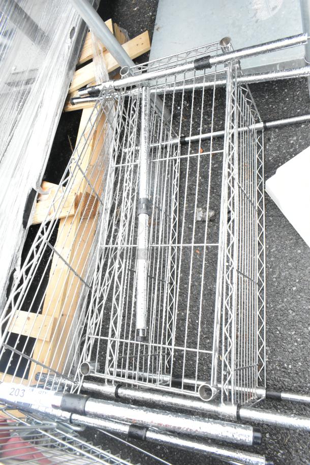 Two chrome finish wire shelving units in good condition, featuring sturdy metal frames and adjustable shelves.