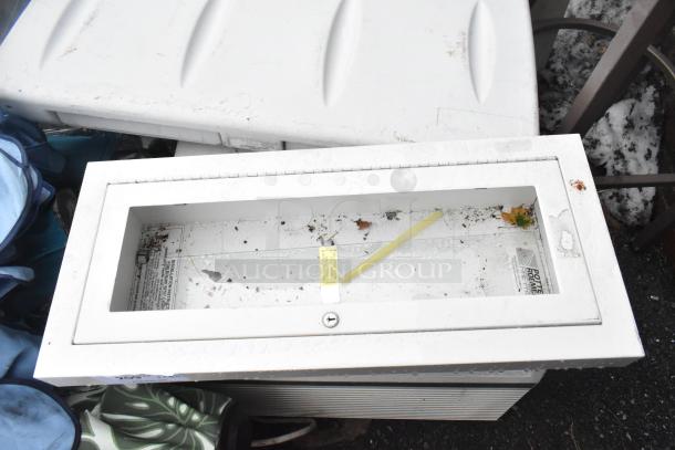 3-item auction: white fire extinguisher cabinet with installation instructions, showing wear. Includes wall mount poly diaper station.